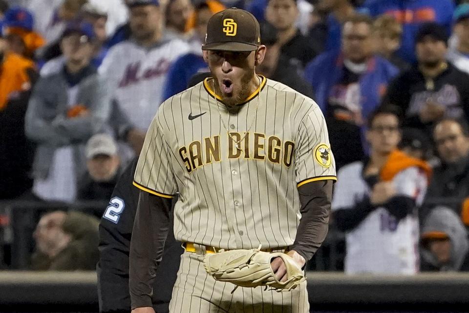 San Diego Padres starting pitcher Joe Musgrove celebrates walking off the mound.