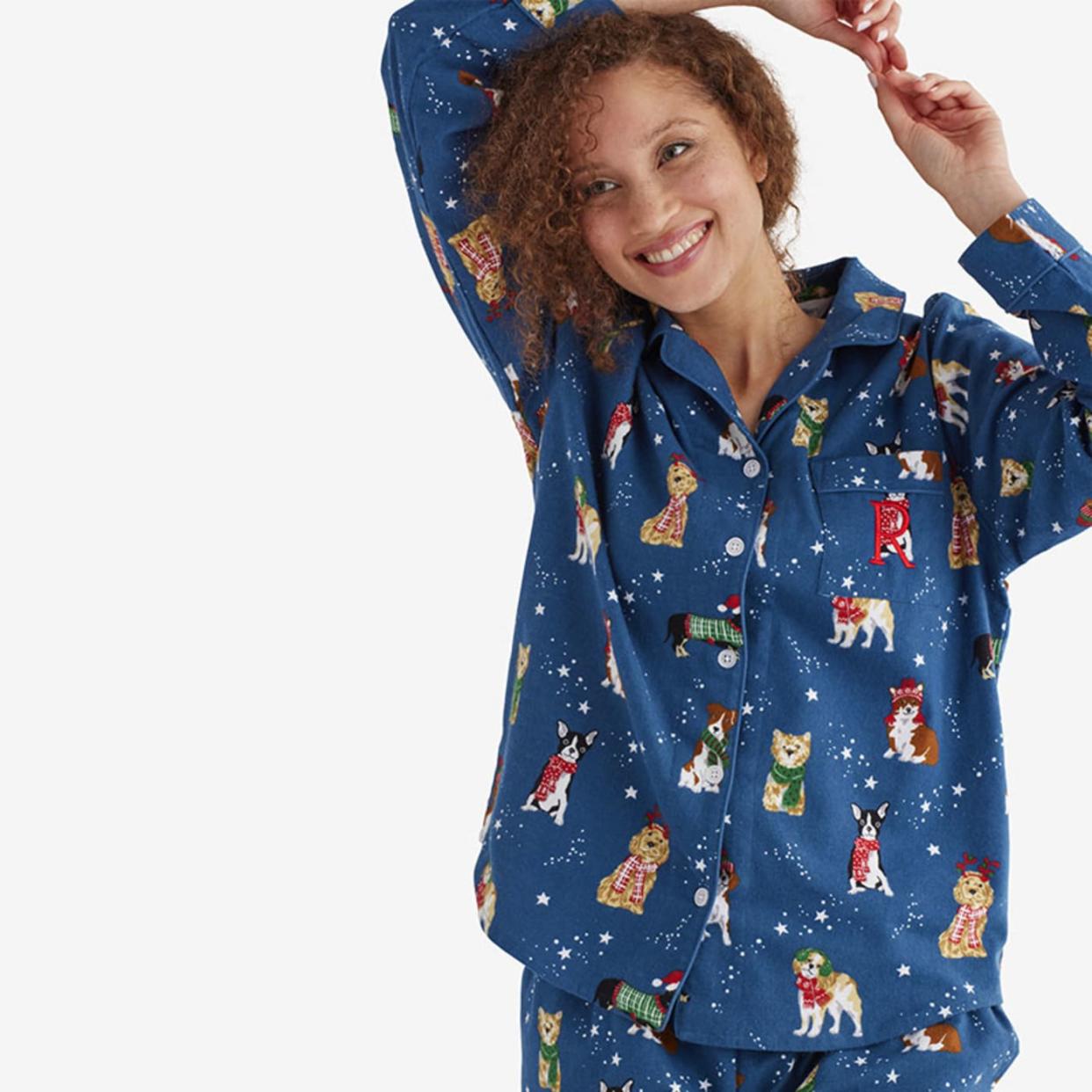 <p><a href="https://go.redirectingat.com?id=74968X1596630&url=https%3A%2F%2Fwww.thecompanystore.com%2Fcompany-cotton-flannel-womens-pajama-set%2F60010A.html%3Fdwvar_60010A_color%3DHOLIDAY%2BPUPS%26dwvar_60010A_size%3DXXL%26cgid%3Dman-holiday-type-pajamas-womens&sref=https%3A%2F%2Fwww.thepioneerwoman.com%2Fholidays-celebrations%2Fgifts%2Fg34385929%2Fchristmas-pajamas-for-women%2F" rel="nofollow noopener" target="_blank" data-ylk="slk:Shop Now;elm:context_link;itc:0;sec:content-canvas" class="link rapid-noclick-resp">Shop Now</a></p><p>Holiday Pups Flannel Classic Pajama Set </p><p>thecompanystore.com</p><p>$89.00</p><span class="copyright">The Company Store</span>