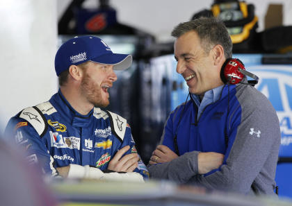 Dale Earnhardt Jr., left, shares a laugh with a crew member before a practice session on Wednesday. (AP)