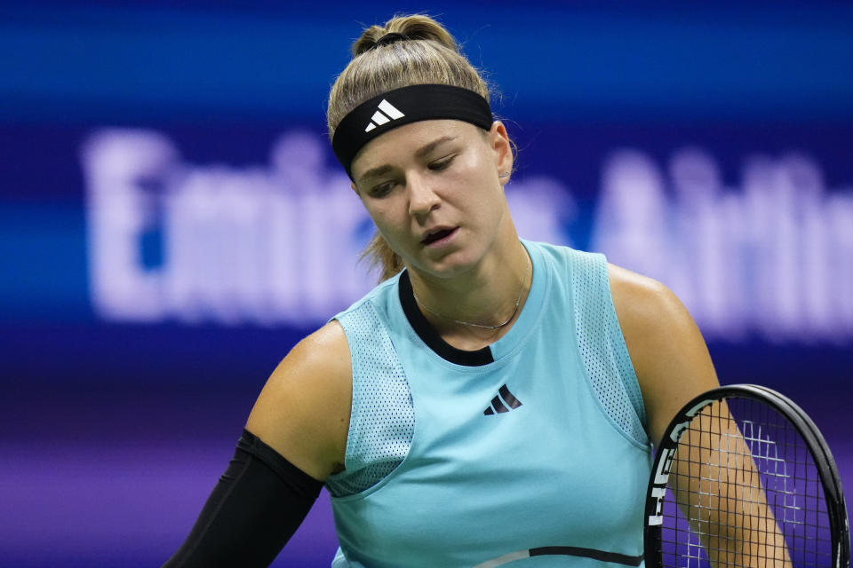 FILE- Karolina Muchova, of the Czech Republic, reacts during a match against Coco Gauff, of the United States, during the women's singles semifinals of the U.S. Open tennis championships, Thursday, Sept. 7, 2023, in New York. French Open runner-up Karolina Muchova pulled out of the WTA Finals on Tuesday because of an injured right wrist and was replaced in the field for the season-ending tournament by Maria Sakkari. (AP Photo/Frank Franklin II, File)