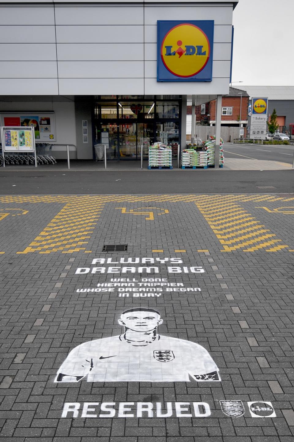 A parking space reserved for England’s Kieran Trippier is seen painted in the car park of an Lidl store in Bury.