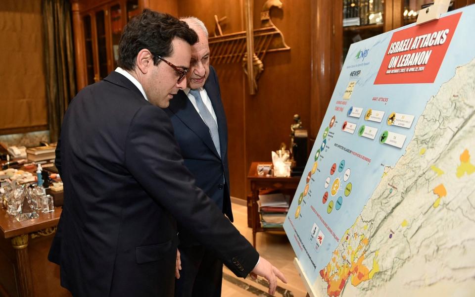 Lebanon's parliament speaker Nabih Berri (R) speaks with France's Stephane Sejourne in Beirut