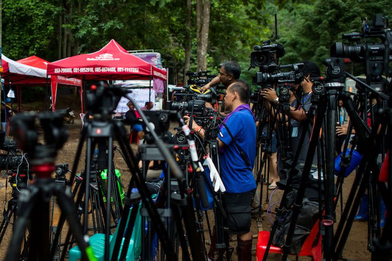 PHOTOS: Divers rescue all 13 from flooded cave in Thailand