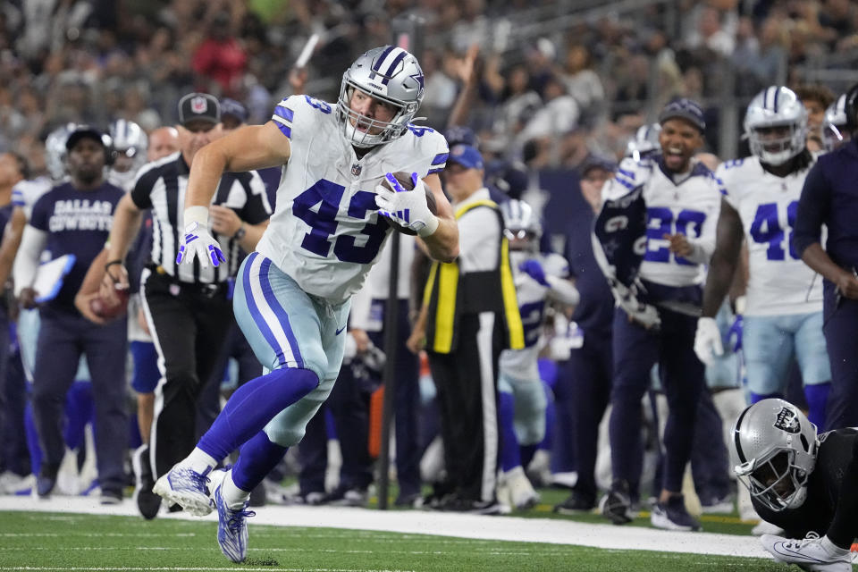 Dallas Cowboys running back Hunter Luepke sprints to the end zone, scoring a touchdown in the first half of a preseason NFL football game against the Las Vegas Raiders in Arlington, Texas, Saturday, Aug. 26, 2023. (AP Photo/Sam Hodde)