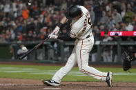 San Francisco Giants' Mike Yastrzemski hits a grand slam home run during the eighth inning of a baseball game against the Arizona Diamondbacks in San Francisco, Tuesday, June 15, 2021. (AP Photo/Jeff Chiu)