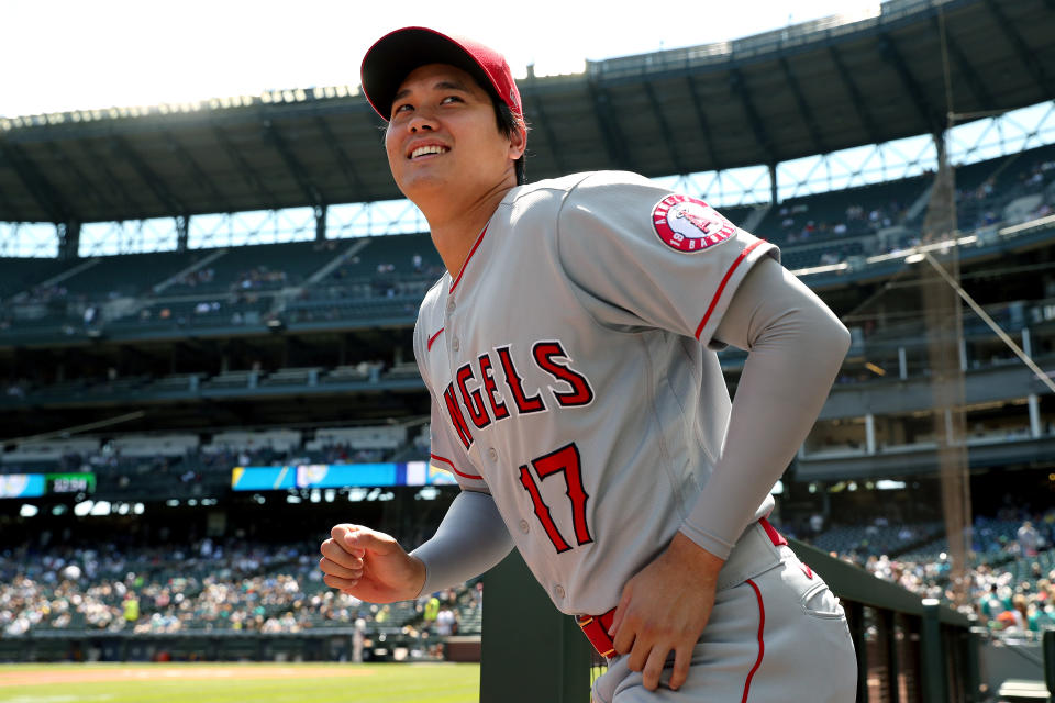 SEATTLE, WASHINGTON - JULY 11: Shohei Ohtani #17 of the Los Angeles Angels takes the field for warm ups before the game against the Seattle Mariners at T-Mobile Park on July 11, 2021 in Seattle, Washington. (Photo by Steph Chambers/Getty Images)