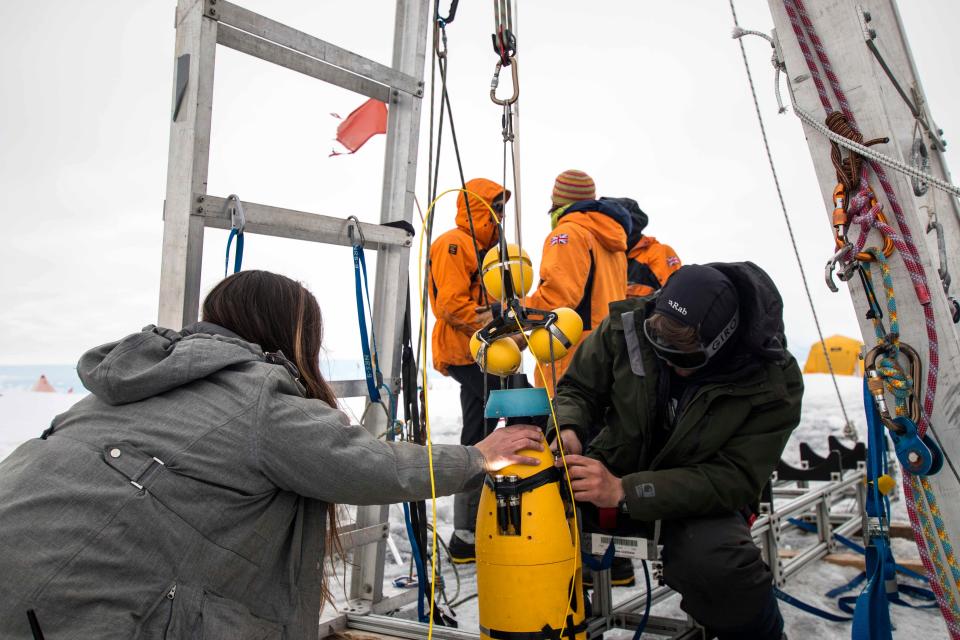 A robot nicknamed Icefin is deployed at Thwaites glacier in Antarctica in January 2020.