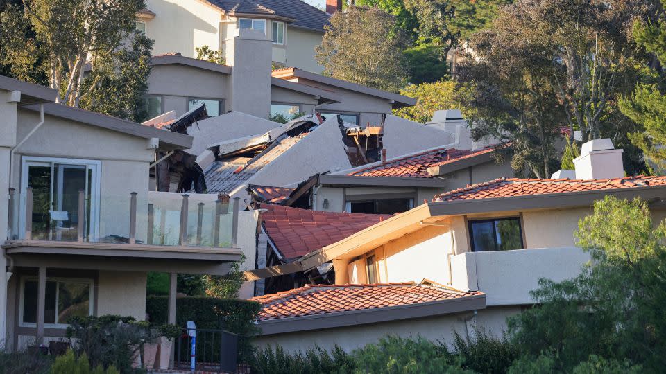 A view shows damaged houses, which were evacuated due to a growing fissure causing a landslide, in Rolling Hills Estates, California. - David Swanson/Reuters