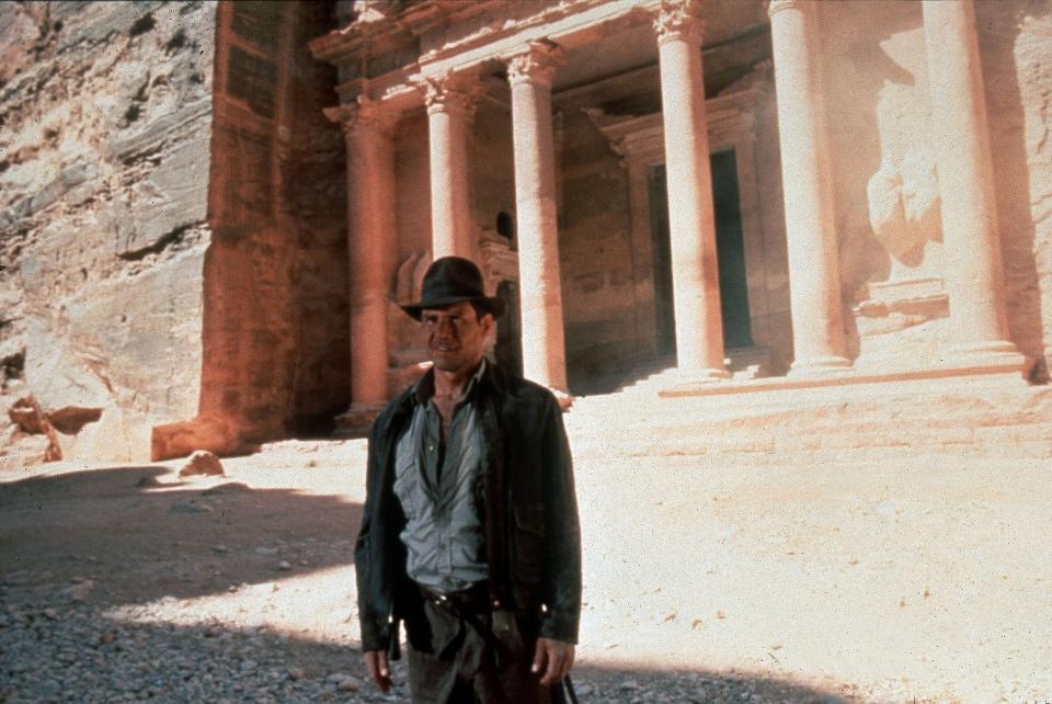 Ford stands in front of the real-life Petra location that served as the exterior to the Grail's final resting place (Photo: Mary Evans/Ronald Grant/Everett Collection)