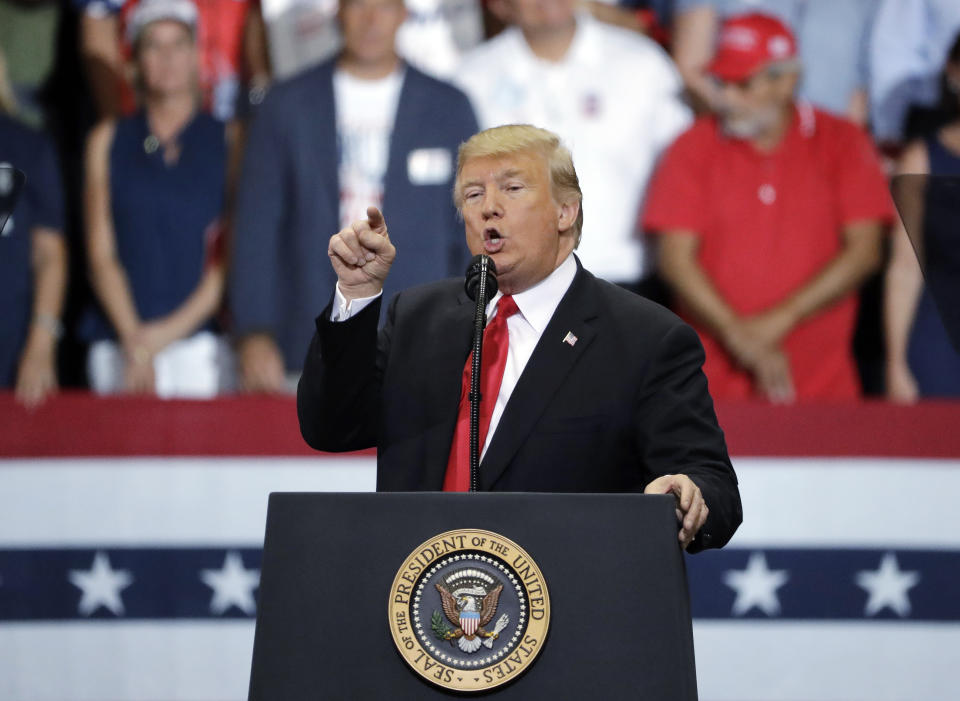 President Donald Trump gestures during a rally Wednesday, Oct. 31, 2018, in Estero, Fla. (AP Photo/Chris O'Meara)