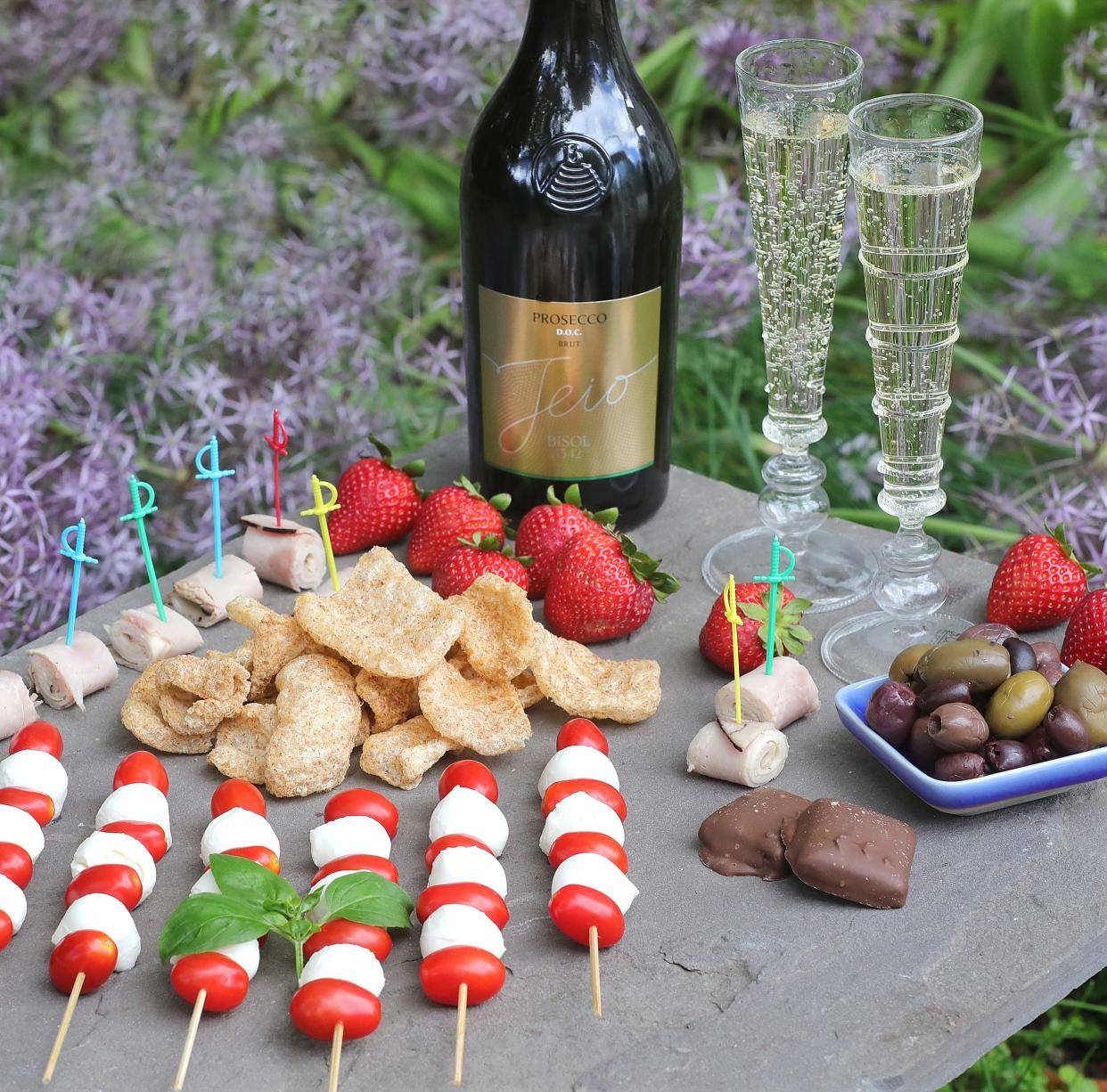 A $30 charcuterie board, including the bottle of prosecco, made from items purchased at Cornerstone Market in Munroe Falls.