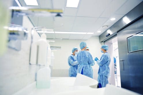   <span class="attribution"><a class="link " href="https://www.shutterstock.com/image-photo/surgeons-interacting-each-other-operation-room-584313532" rel="nofollow noopener" target="_blank" data-ylk="slk:Syda Syda Productions/Shutterstock;elm:context_link;itc:0;sec:content-canvas">Syda Syda Productions/Shutterstock</a></span>