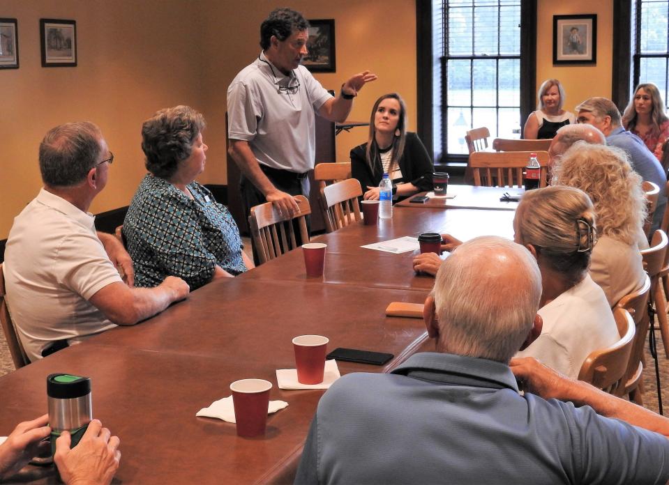 Rep. Troy Balderson talks with Coshocton stakeholders and local officials during a recent roundtable discussion part of a Coffee and Commerce event with the Coshocton County Chamber of Commerce.