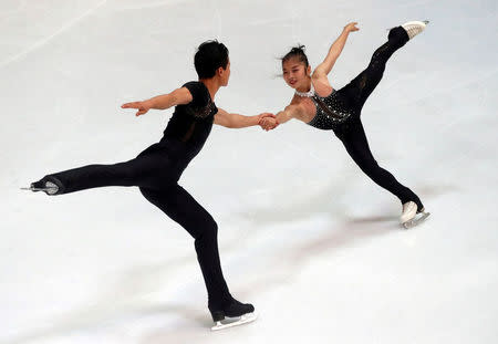 FILE PHOTO: Figure Skating - Olympic Qualifying ISU Challenger Series - Pairs Free Skating - Oberstdorf, Germany - September 29, 2017 - Ryom Tae-Ok and Kim Ju-Sik of North Korea compete. REUTERS/Michael Dalder /File Photo