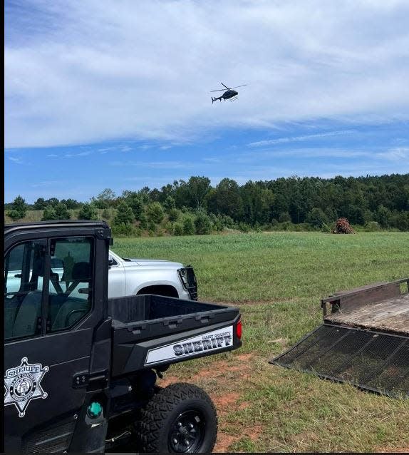 A helicopter was brought in to assist in the search of an area near where a missing man's truck was found in Hart County.