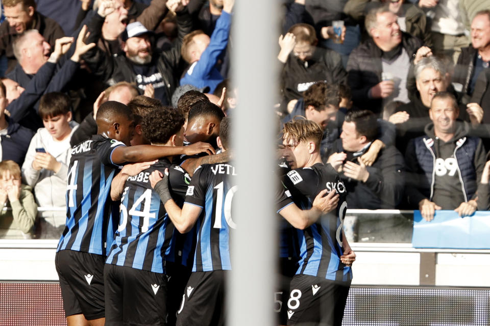 Players celebrate after Brugge's Maxim De Cuyper scored the opening goal during the Europa Conference League semi-final second leg soccer match between Club Brugge and Fiorentina at the Jan Breydel Stadium in Bruges, Belgium, Wednesday, May 8, 2024. (AP Photo/Omar Havana)