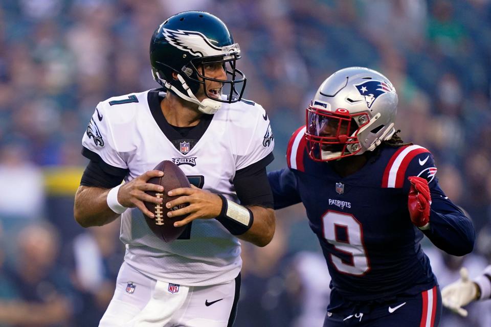 The Patriots' Matt Judon, right, runs at Eagles quarterback Joe Flacco during the first half on Thursday, Aug. 19, 2021.