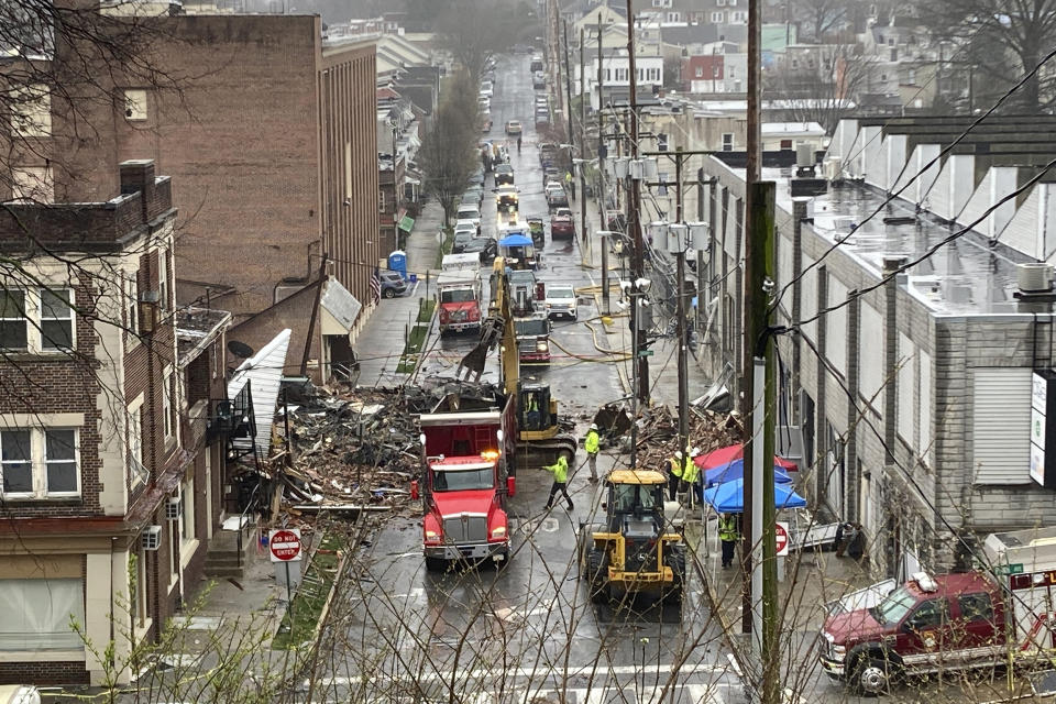 Emergency responders and heavy equipment are seen at the site of a deadly explosion at a chocolate factory in West Reading, Pennsylvania, Saturday, March 25. (Michael Rubinkam / AP file)