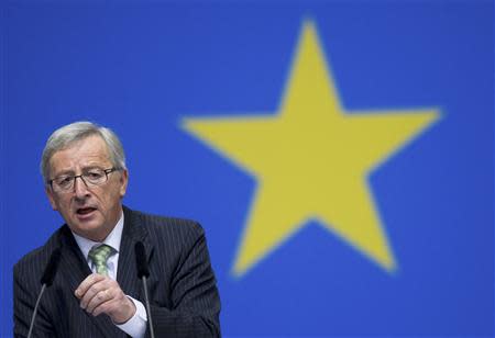 Jean-Claude Juncker, former prime minister of Luxembourg and top candidate of European People's Party for European parliamentary elections, speaks during the Christian Democratic Union (CDU) congress in Berlin April 5, 2014. REUTERS/Stefanie Loos