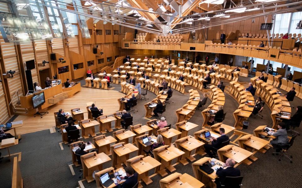 SNP leader Nicola Sturgeon delivers her speech in support of her candidacy to be re-elected as Scotland's First Minister at Holyrood - PA