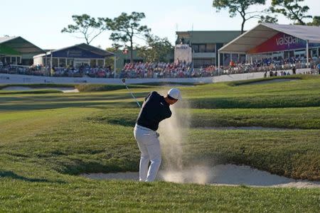 Mar 24, 2019; Palm Harbor, FL, USA; Paul Casey plays his shot from a bunker on the 18th hole during the final round of the Valspar Championship golf tournament at Innisbrook Resort - Copperhead Course. Mandatory Credit: Jasen Vinlove-USA TODAY Sports