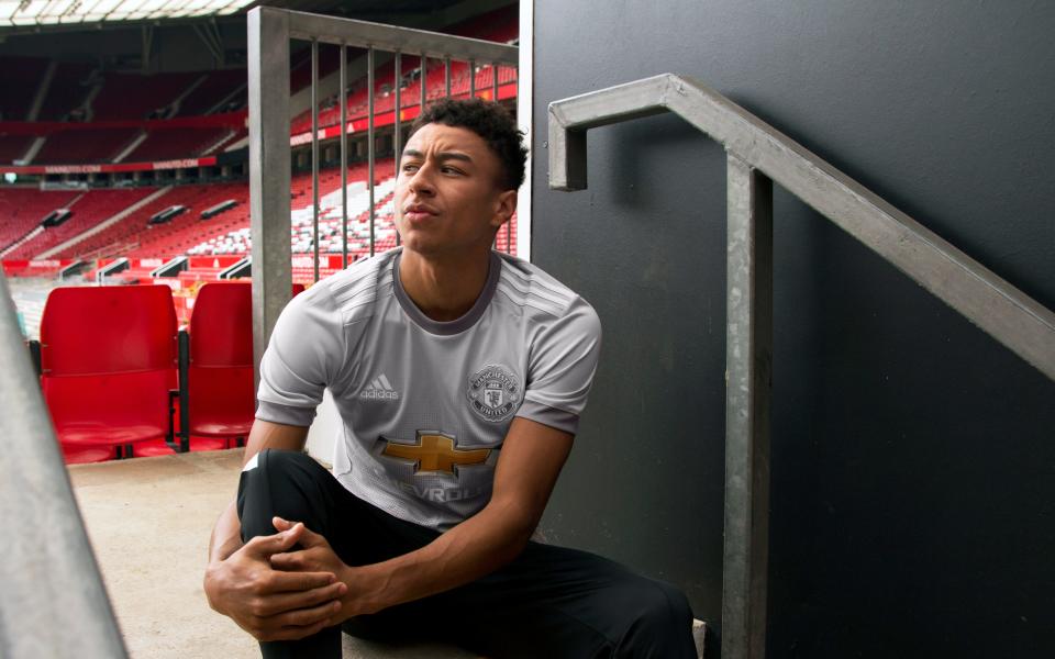 Jesse Lingard sports United's new grey kit - Credit: ADIDAS