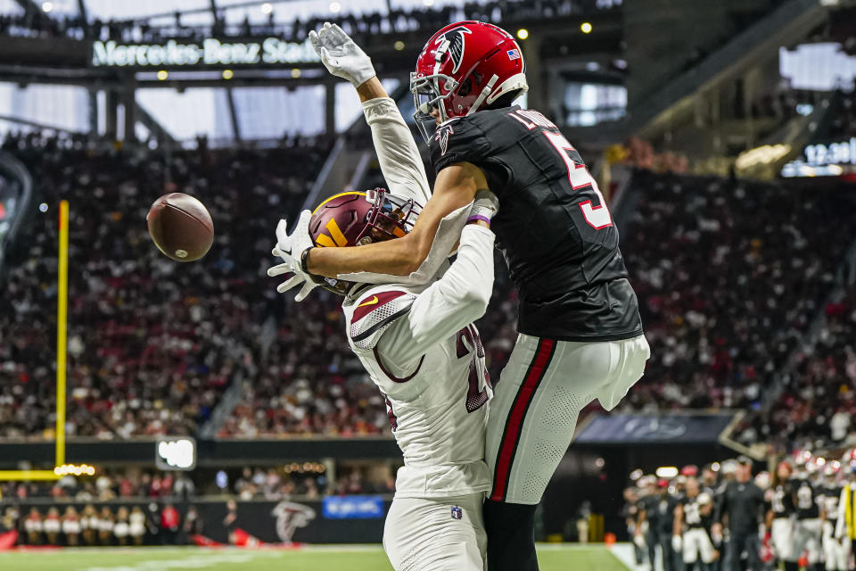 Oct 15, 2023; Atlanta, Georgia, USA; Washington Commanders cornerback Benjamin St-Juste (25) is called for pass interference on Atlanta Falcons wide receiver Drake London (5) on a two point conversion attempt during the second half at Mercedes-Benz Stadium. Mandatory Credit: Dale Zanine-USA TODAY Sports