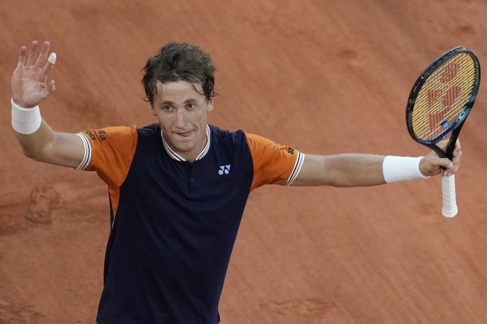 Norway's Casper Ruud celebrates winning his semifinal match of the French Open tennis tournament against Germany's Alexander Zverev, in three sets, 6-3, 6-4, 6-0, at the Roland Garros stadium in Paris, Friday, June 9, 2023. (AP Photo/Thibault Camus)