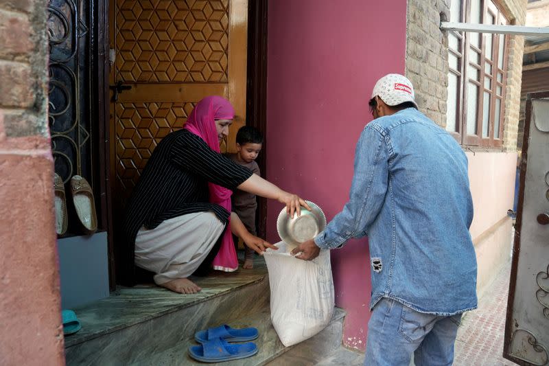 Kashmiri Ramadan drummers wake Muslims up for their meal before daybreak, in Srinagar