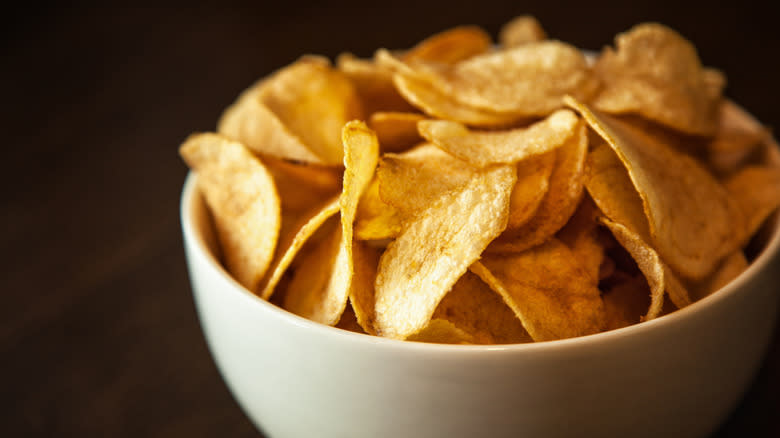 Crisp chips in white bowl