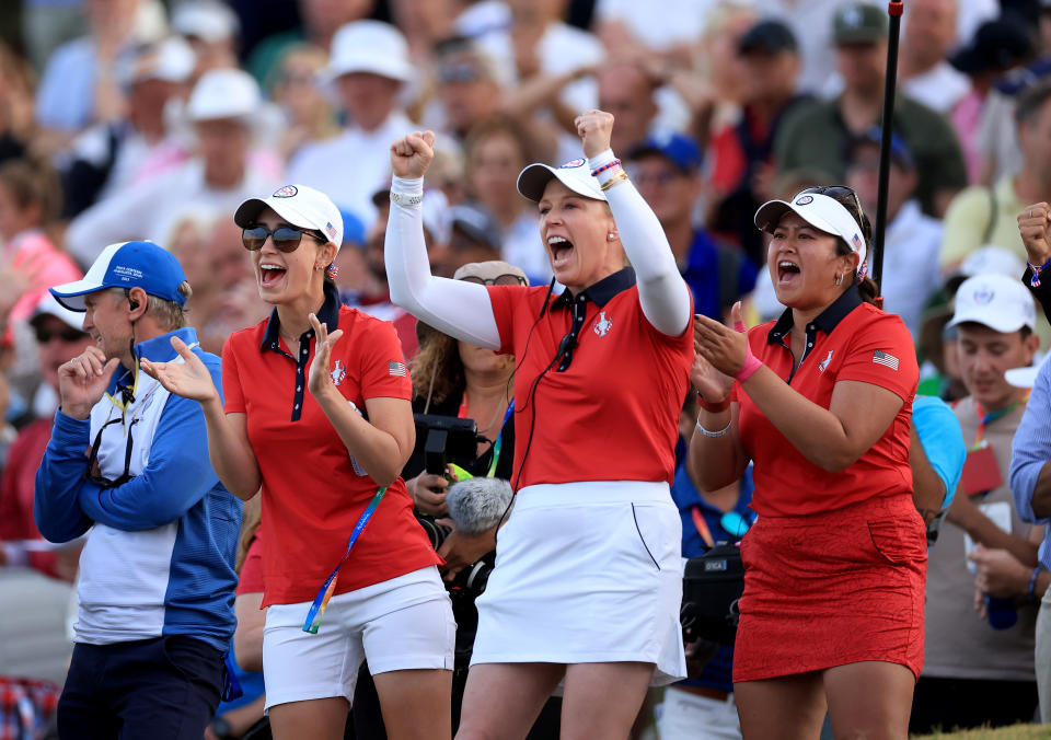 United States vice-captain Morgan Pressel celebrates another American point with Cheyenne Knight (L) and Lilia Vu (R) during the afternoon four-ball matches on Day One of the Solheim Cup at Finca Cortesin Golf Club on September 22, 2023 in Casares, Spain. (Photo by David Cannon/Getty Images)