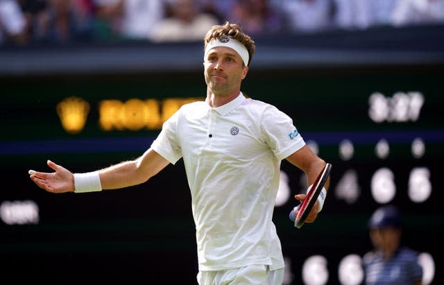 Liam Broady celebrates victory over Casper Ruud