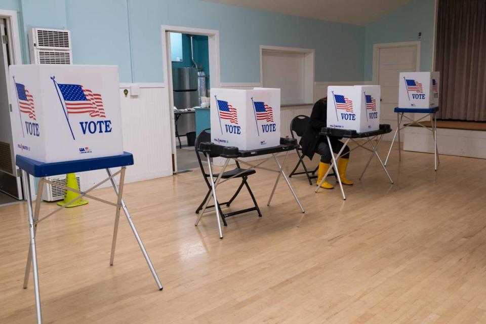 A voters casts their ballot at the polling place located at Shell Beach Veterans Hall on Nov. 8, 2022.