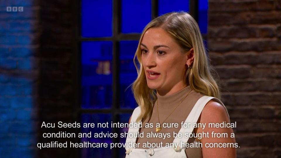dragon's den 2024, giselle boxer ear seeds pitch, with warning caption on screen