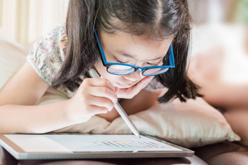 Additional screen time because of remote learning might be affecting your child. To help, we've found some of he best blue light-blocking glasses for kids. (Photo: Chinnapong via Getty Images)