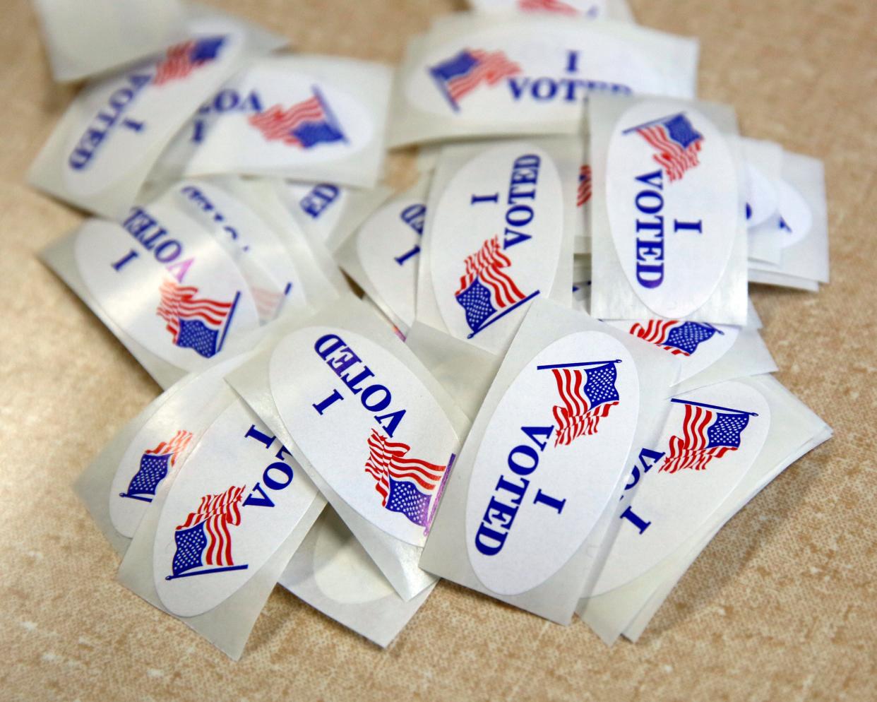 Voting stickers are shown on a table in the polling place at Central Presbyterian Church in 2019.