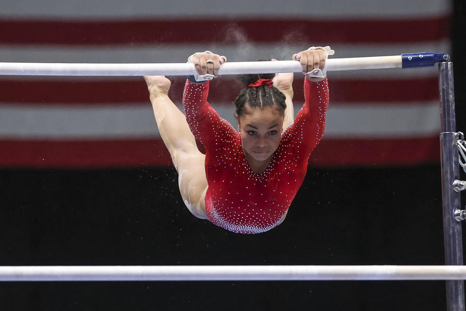 Konnor McClain competes on the uneven bars during the U.S. Gymnastics Championships, Sunday, Aug. 21, 2022, in Tampa, Fla. (AP Photo/Mike Carlson)