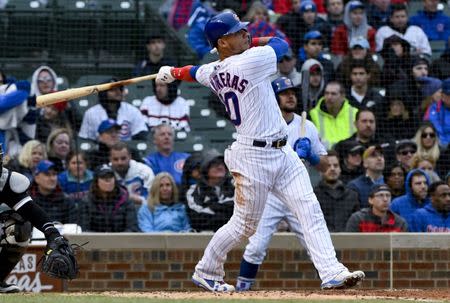 May 12, 2018; Chicago, IL, USA; Chicago Cubs catcher Willson Contreras (40) hits a two run home run against the Chicago White Sox in the seventh inning at Wrigley Field. Mandatory Credit: Matt Marton-USA TODAY Sports