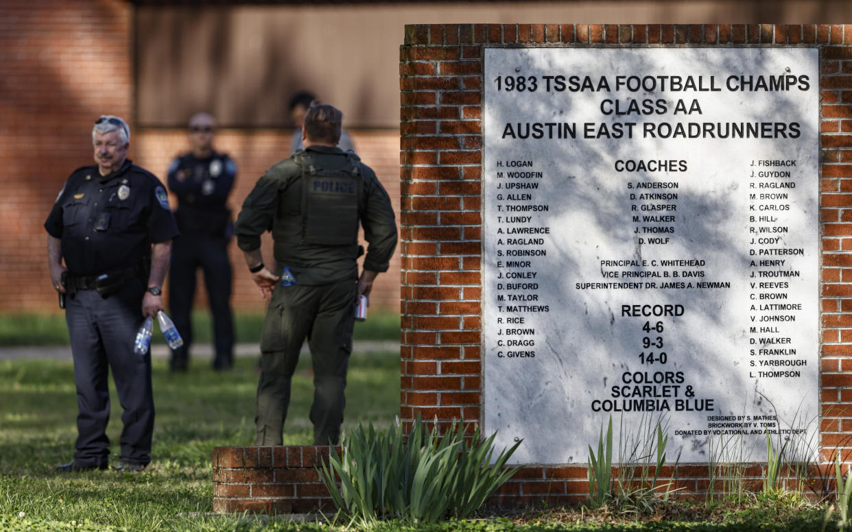 Knoxville police work the scene of a shooting at Austin-East Magnet High School Monday, April 12, 2021, in Knoxville, Tenn. (AP Photo/Wade Payne)