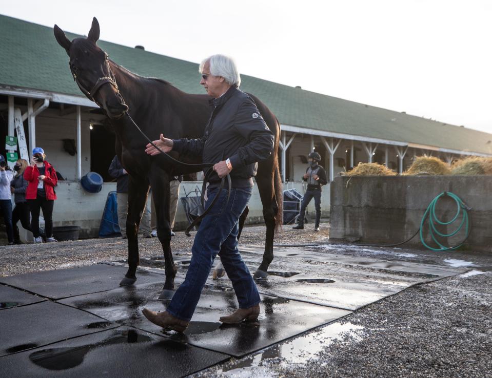 Bob Baffert brings Kentucky Derby winner Medina Spirit out for fans to see on the morning after the race. Medina Spirit is Baffert's seventh Kentucky Derby winner. May 2, 2021