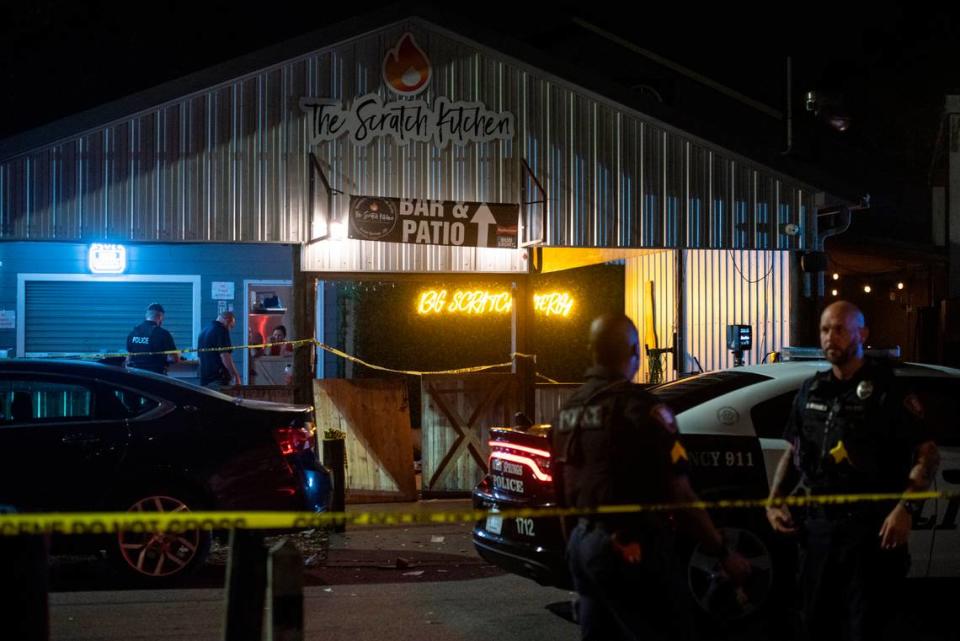 Crime scene tape surrounds The Scratch Kitchen restaurant in Ocean Springs after a shooting left 1 dead and several injured on Friday, May 5, 2023.