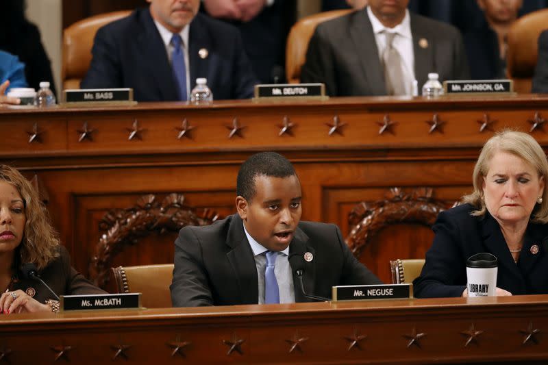 House Judiciary Committee Chairman Rep. Joe Neguse, D-CO., votes for the first of two articles during a House Judiciary Committee markup of the articles of impeachment against President Donald Trump in Washington