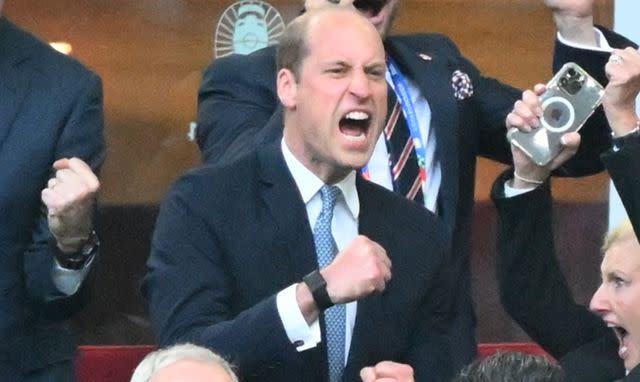 <p>Gokhan Balci/Anadolu via Getty </p> Prince William cheers at the end of the UEFA EURO 2024 quarter-final match between England and Switzerland in Dusseldorf, Germany on July 6, 2024.