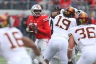 Oct 13, 2018; Columbus, OH, USA; Ohio State Buckeyes quarterback Dwayne Haskins (7) drops to throw against the Minnesota Golden Gophers during the first quarter at Ohio Stadium. Mandatory Credit: Joe Maiorana-USA TODAY Sports