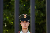 <p>A paramilitary police officer stands guard near the site of a blast at the U.S. Embassy in Beijing, July 26, 2018. (Photo: Damir Sagolj/Reuters) </p>