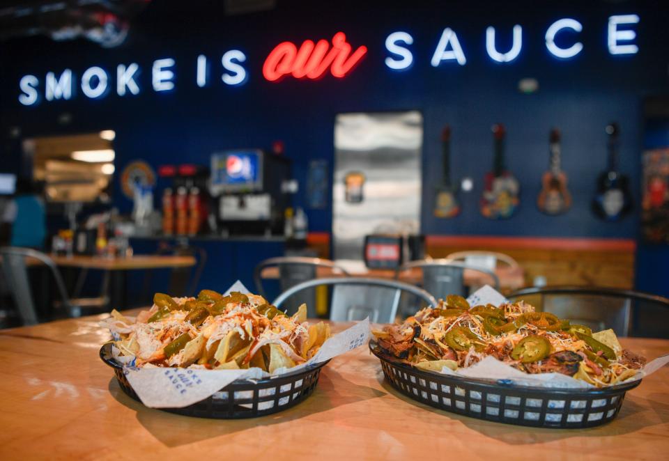 Central BBQ's Chicken and Pork nachos with shredded cheese and crispy tortilla chips topped with jalapeños, will be served at the concession stands at GEODIS Park in Nashville, Tenn., pictured Friday, April 22, 2022.