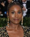 <p>Actress <strong>Issa Rae</strong>'s <a href="https://www.goodhousekeeping.com/beauty/hair/g27542026/updos-for-short-hair/" rel="nofollow noopener" target="_blank" data-ylk="slk:glam updo hairstyle;elm:context_link;itc:0;sec:content-canvas" class="link ">glam updo hairstyle</a> has an extra touch of sparkle with gold embellishments. With or without the decorative beads, this Fulani braids look is both regal and fun. </p><p><a class="link " href="https://www.amazon.com/dp/B0771BSXWS/ref=sspa_dk_detail_3?tag=syn-yahoo-20&ascsubtag=%5Bartid%7C10055.g.2471%5Bsrc%7Cyahoo-us" rel="nofollow noopener" target="_blank" data-ylk="slk:SHOP BEADS;elm:context_link;itc:0;sec:content-canvas">SHOP BEADS</a></p>