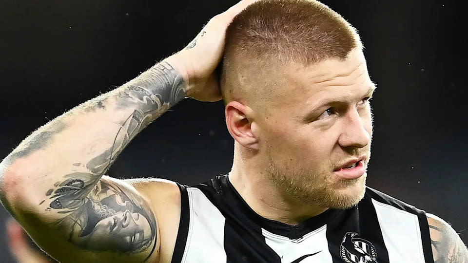 Seen here, Jordan de Goey reacts with disappointment after a Collingwood game in 2021.