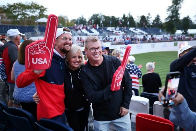 Happy US fans reached the first tee for the Solheim Cup, but many others had to give up due to long lines and waits for buses to get to the event (Scott Taetsch)