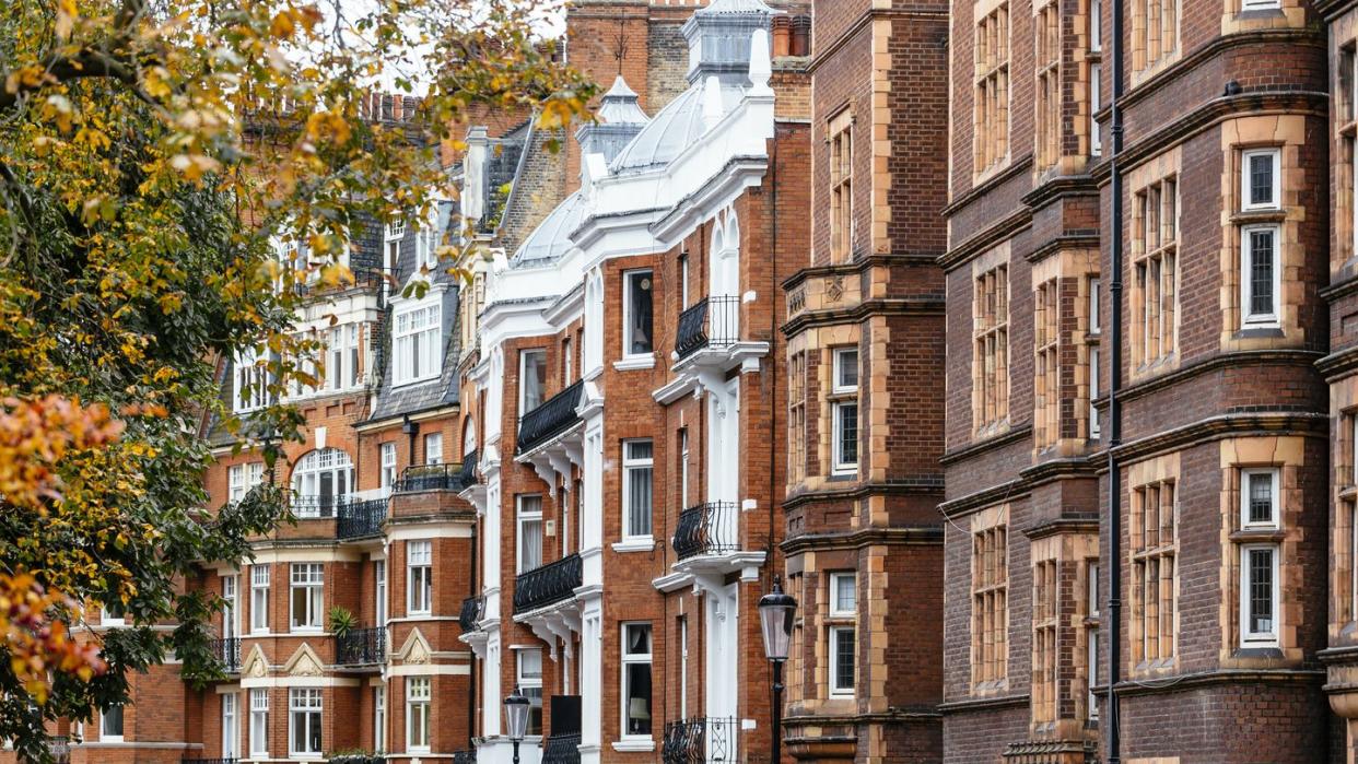 old red brick houses facades in kensington, chelsea, london
